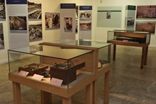 Overall view of the central cases displaying excavation tools